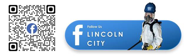 worker posing in a hard hat